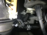Broken hose w-sensor coming up from transmission.webp Broken hose w-sensor coming up from transmission.webp